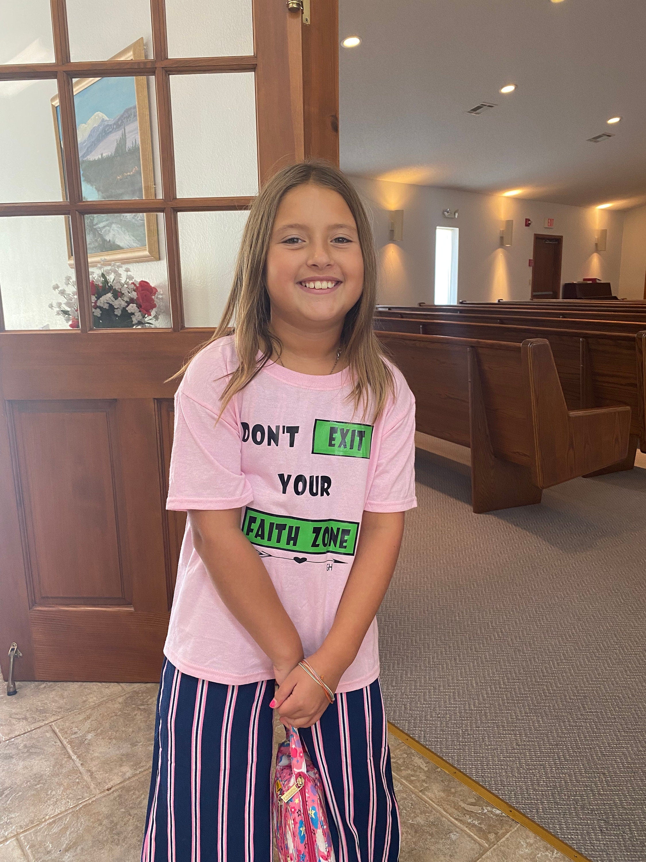T-shirt: “Don’t exit your faith zone “